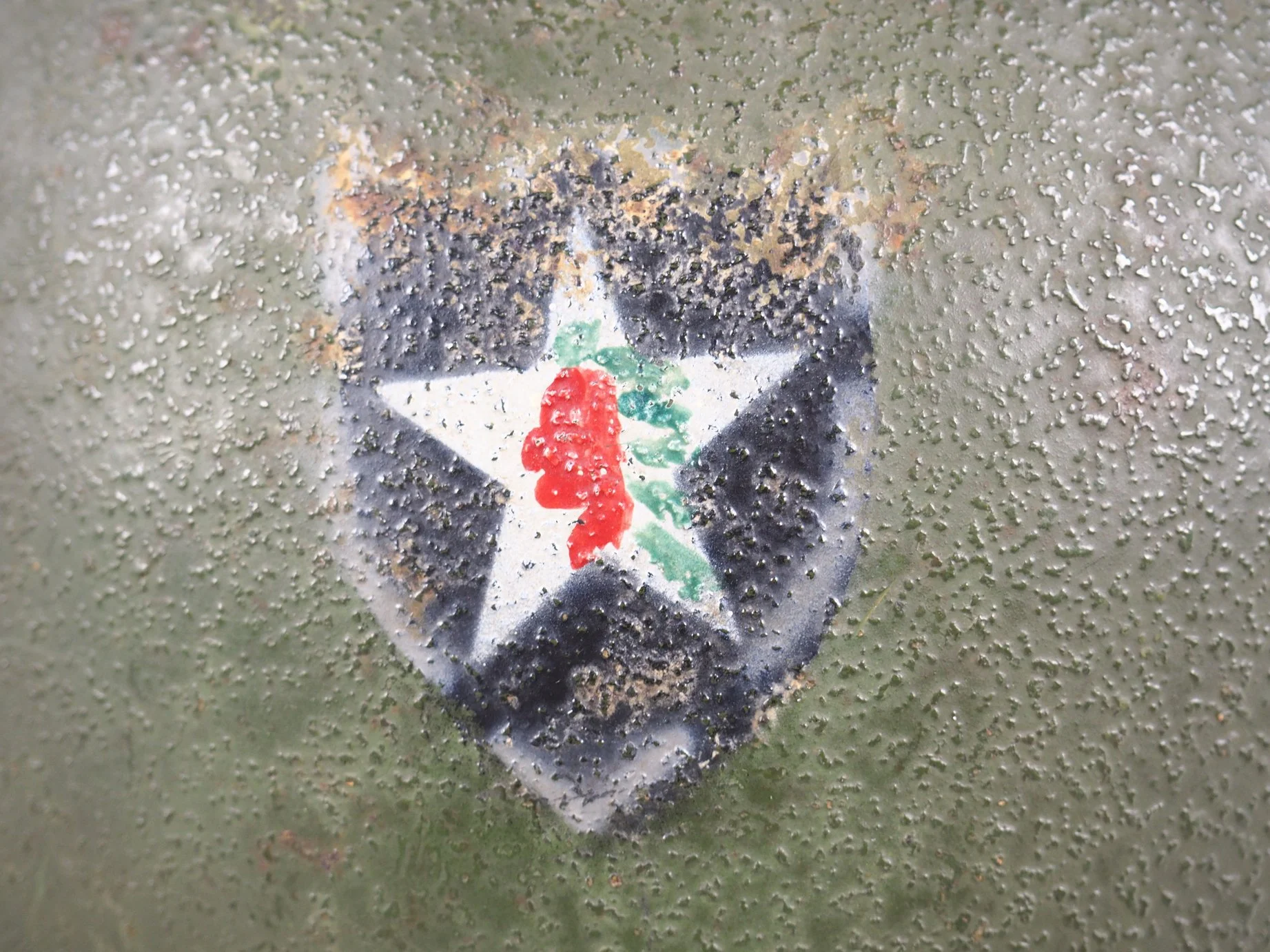 Sergeant Lenhart's helmet was very clearly painted with three different stencils and a hand painted "Chief".