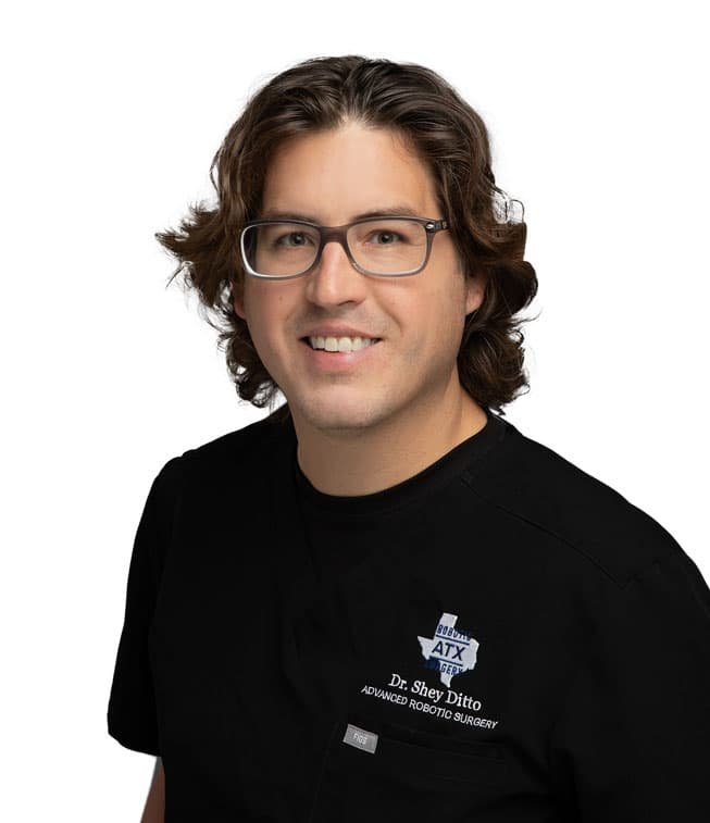 Portrait of Dr. Shey Ditto, general and robotic surgeon at ATX Robotic Surgery in Austin, Texas.
