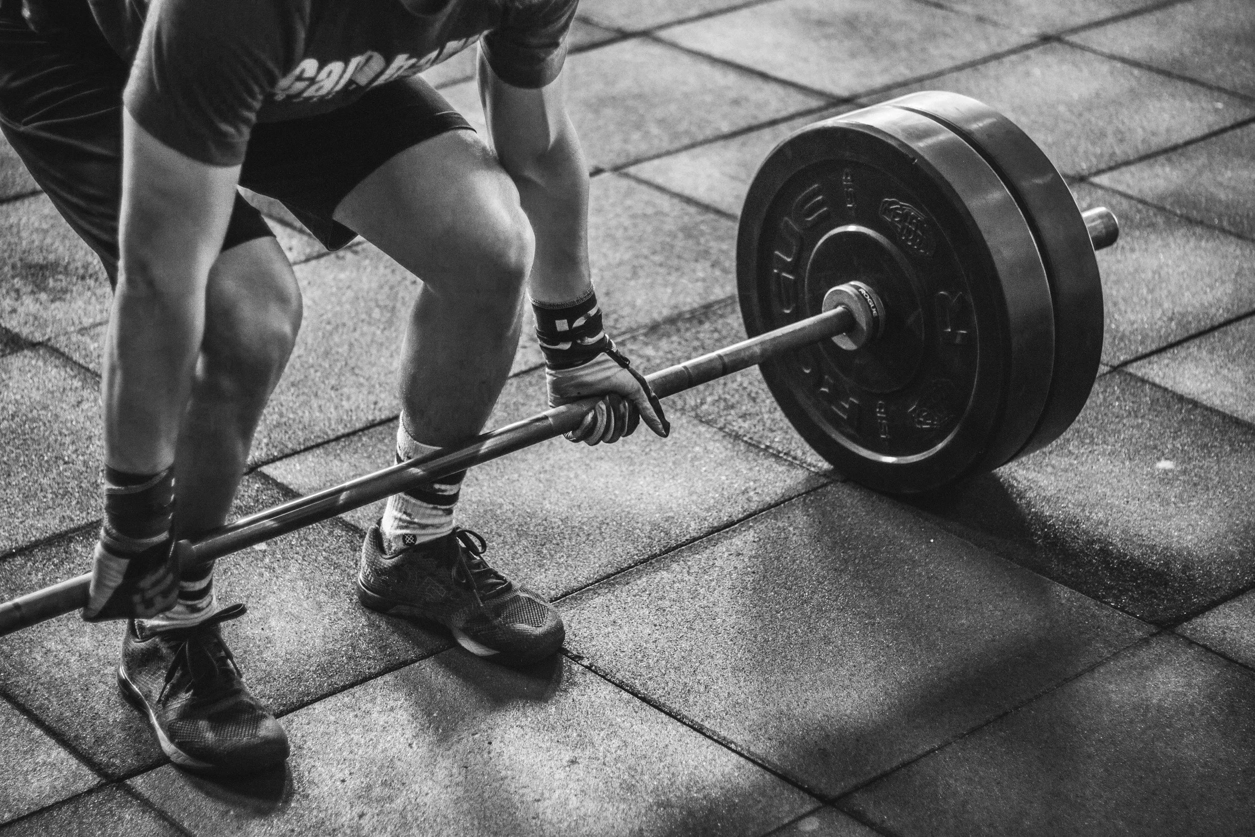 A client at FORGE CHS performing a deadlift in the 10,000 sq ft gym in West Ashley, Charleston