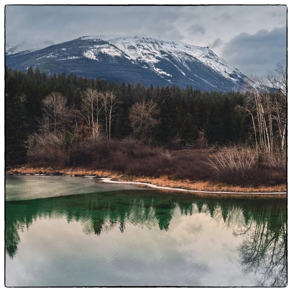 This is a Third Lake on the Valley of the Five Lakes hike in November. The green reflection reminded me a semi-precious stone Malachite.