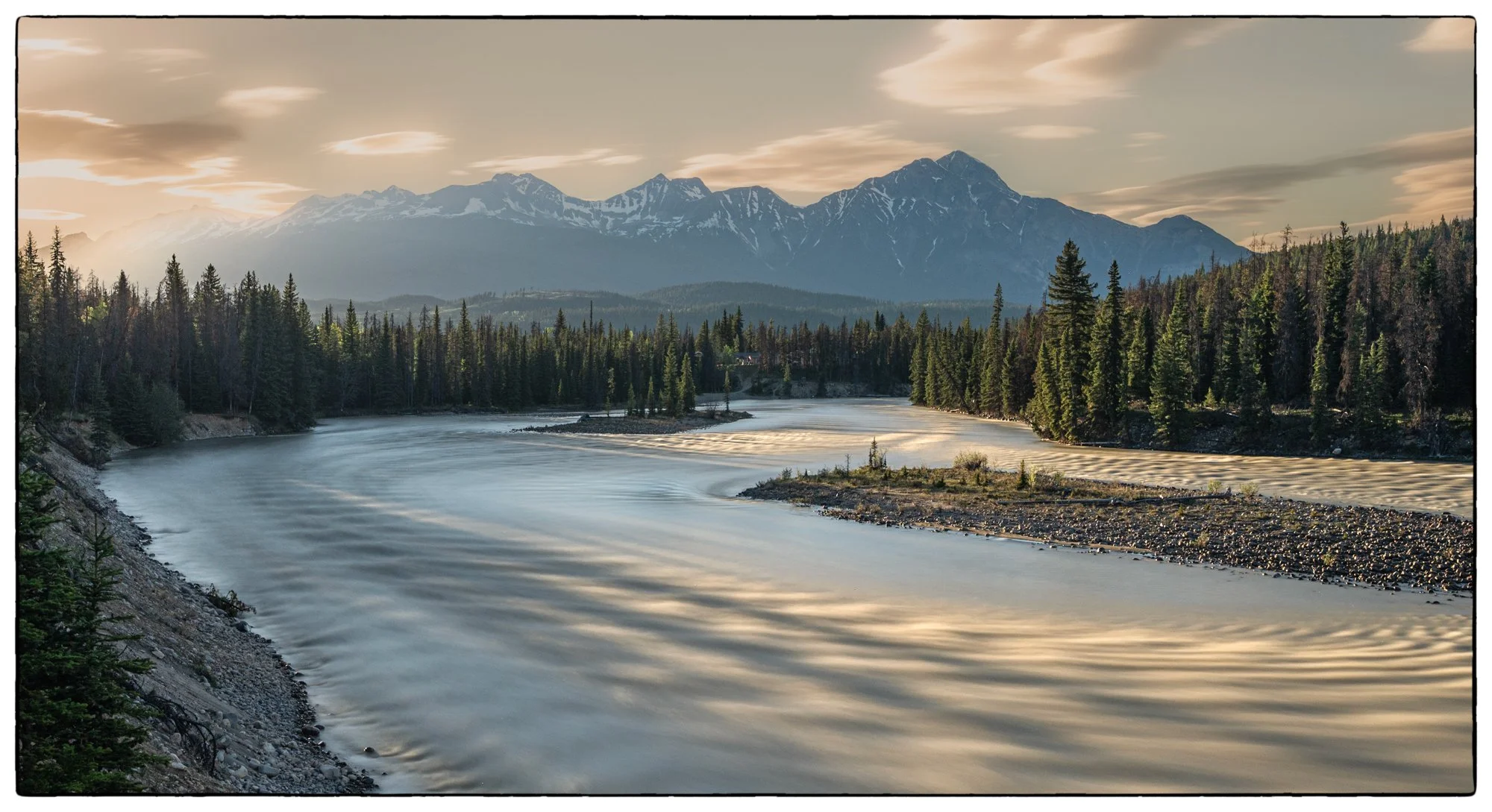 Walking in the evening by the Athabasca river by the Wabasso Campgrounds.