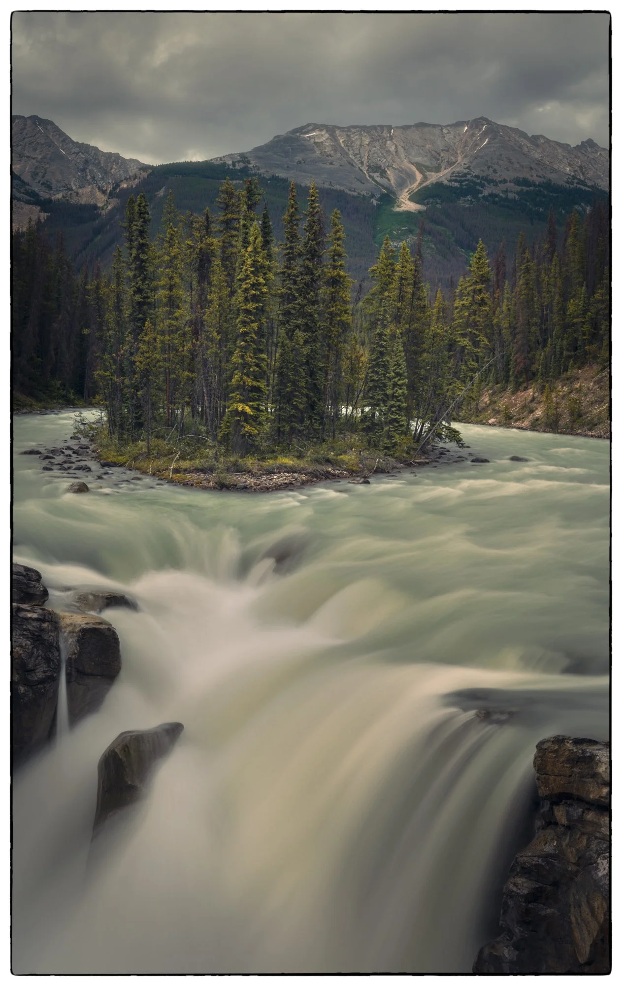 Sunwapta Falls on overcast late evening 