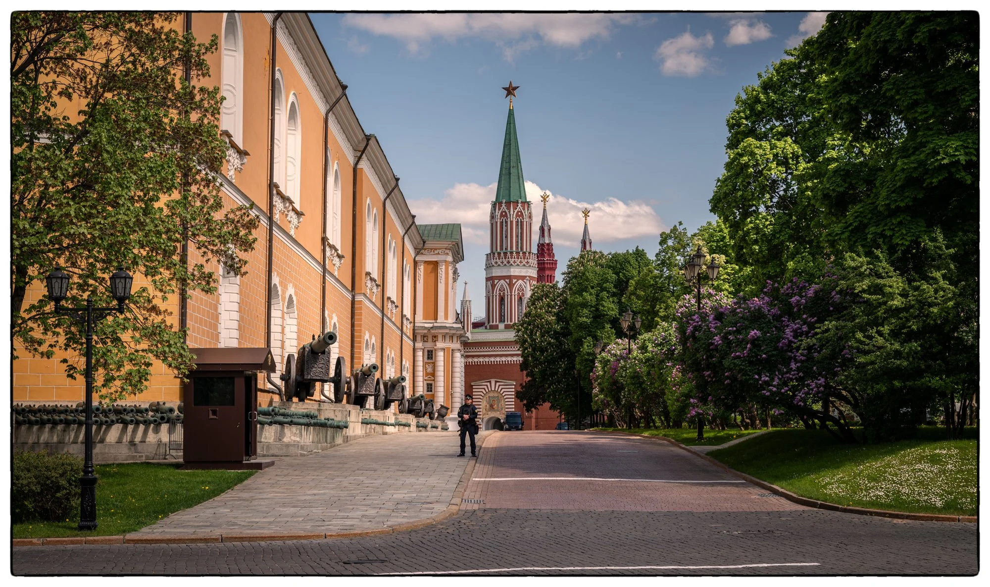 On the Moscow Kremlin grounds. This is The Kremlin Arsenal building and Nikolskaya (Nikolas) Tower on the back