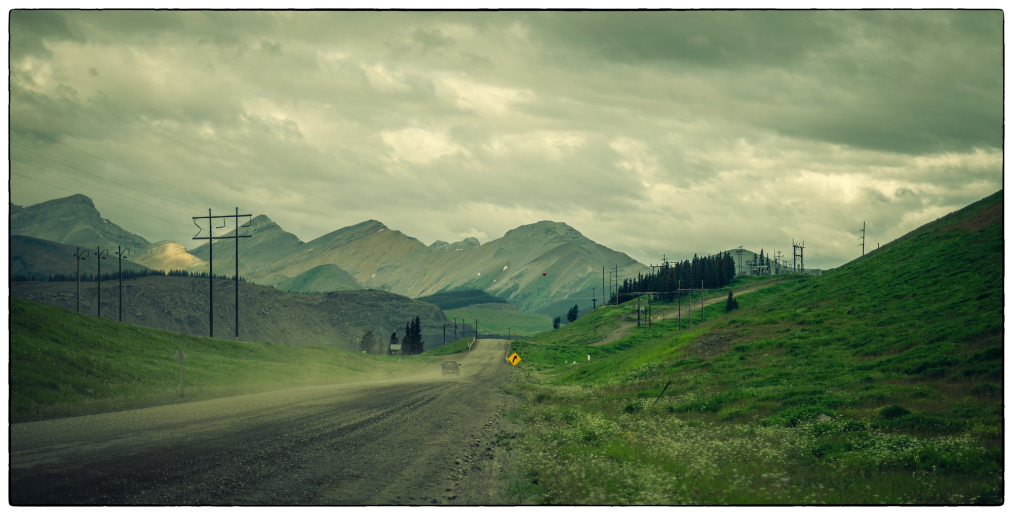 Driving gravel road towards Cadomin town 