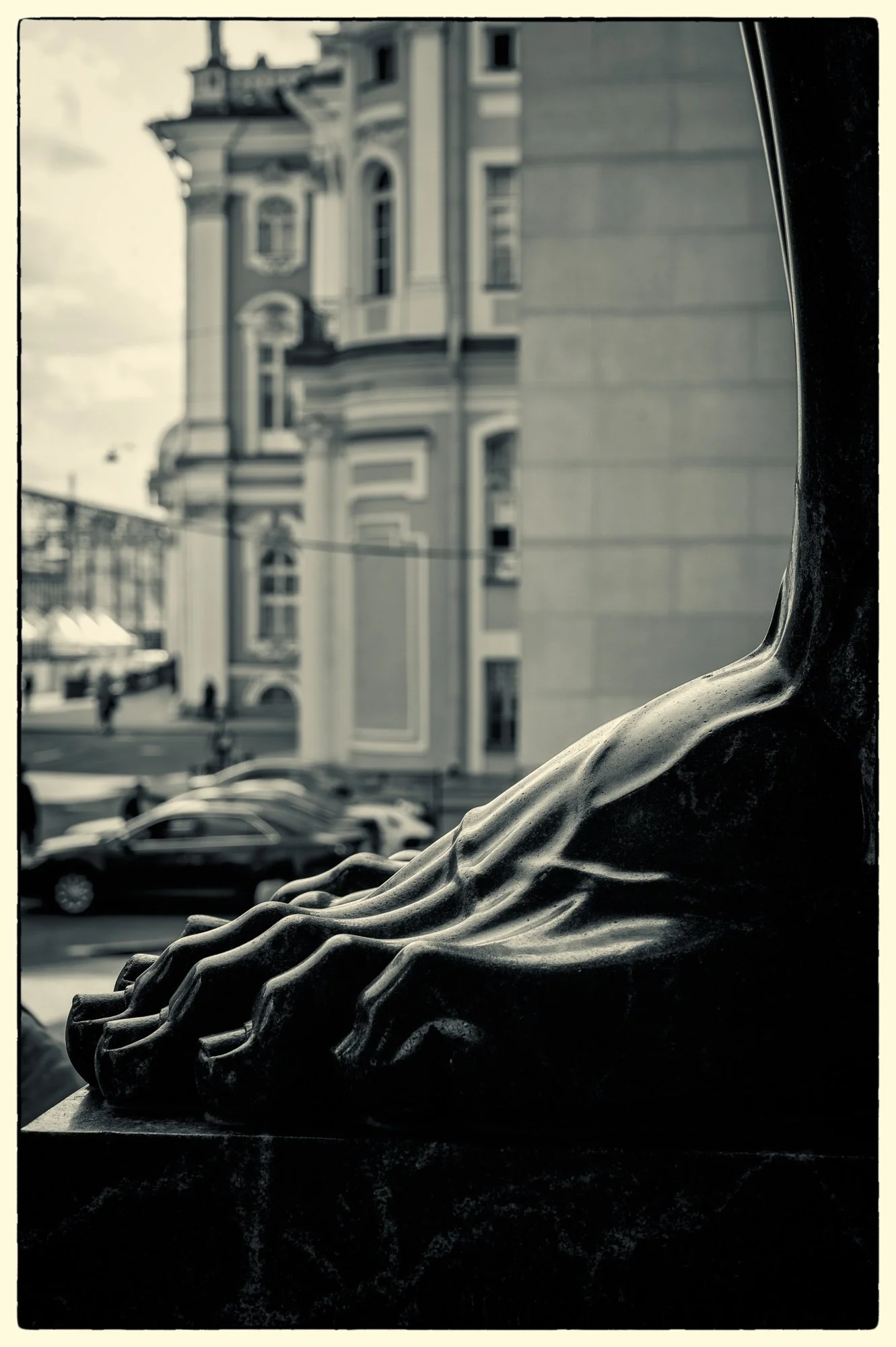 Always wanted to take this photo, the foot of the giant granite Atlant on the front with the Hermitage building out of focus on the back. I saw similar photo in "Soviet Photo" magazine about 40 year ago