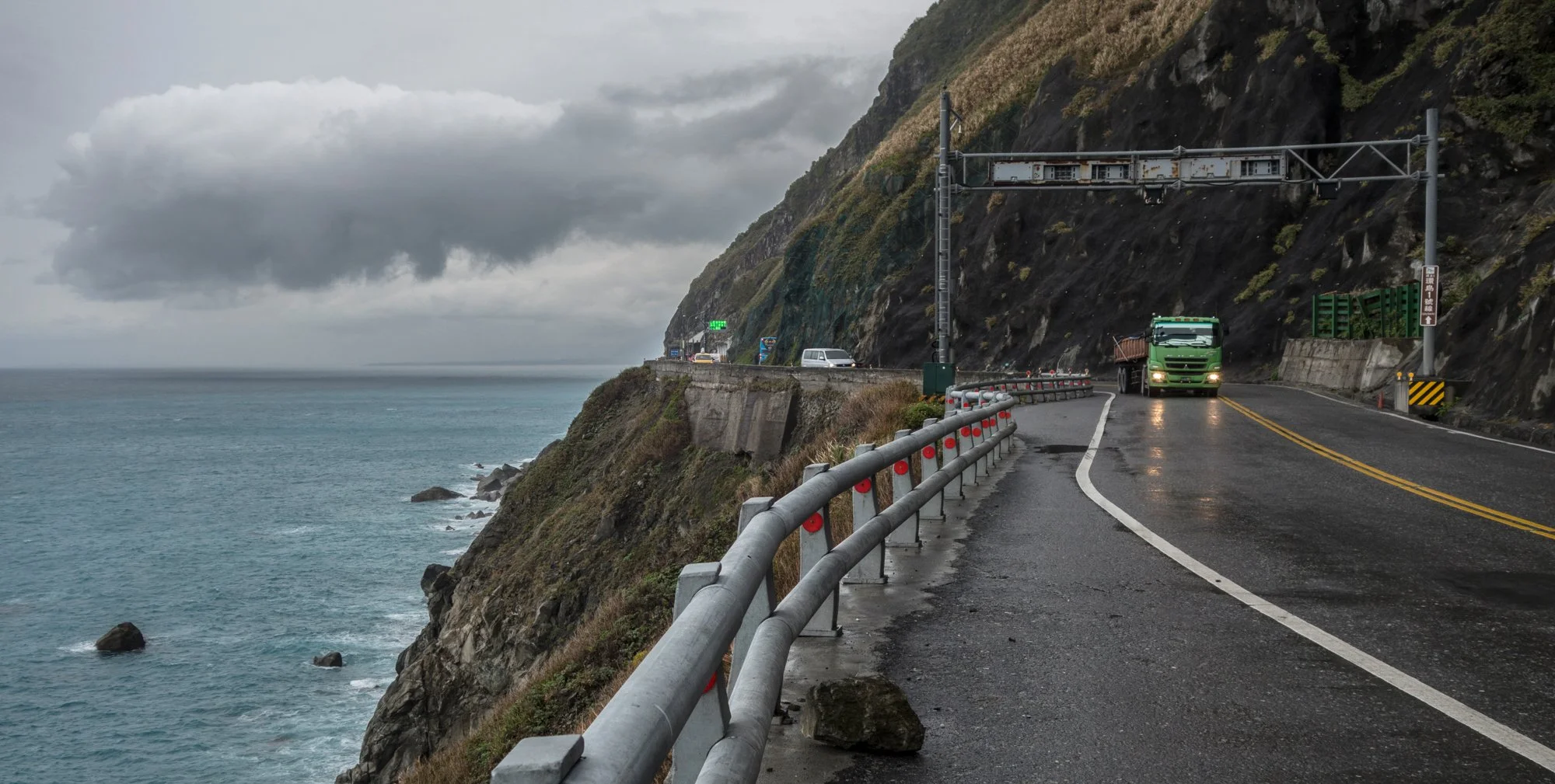 On a road by the ocean.