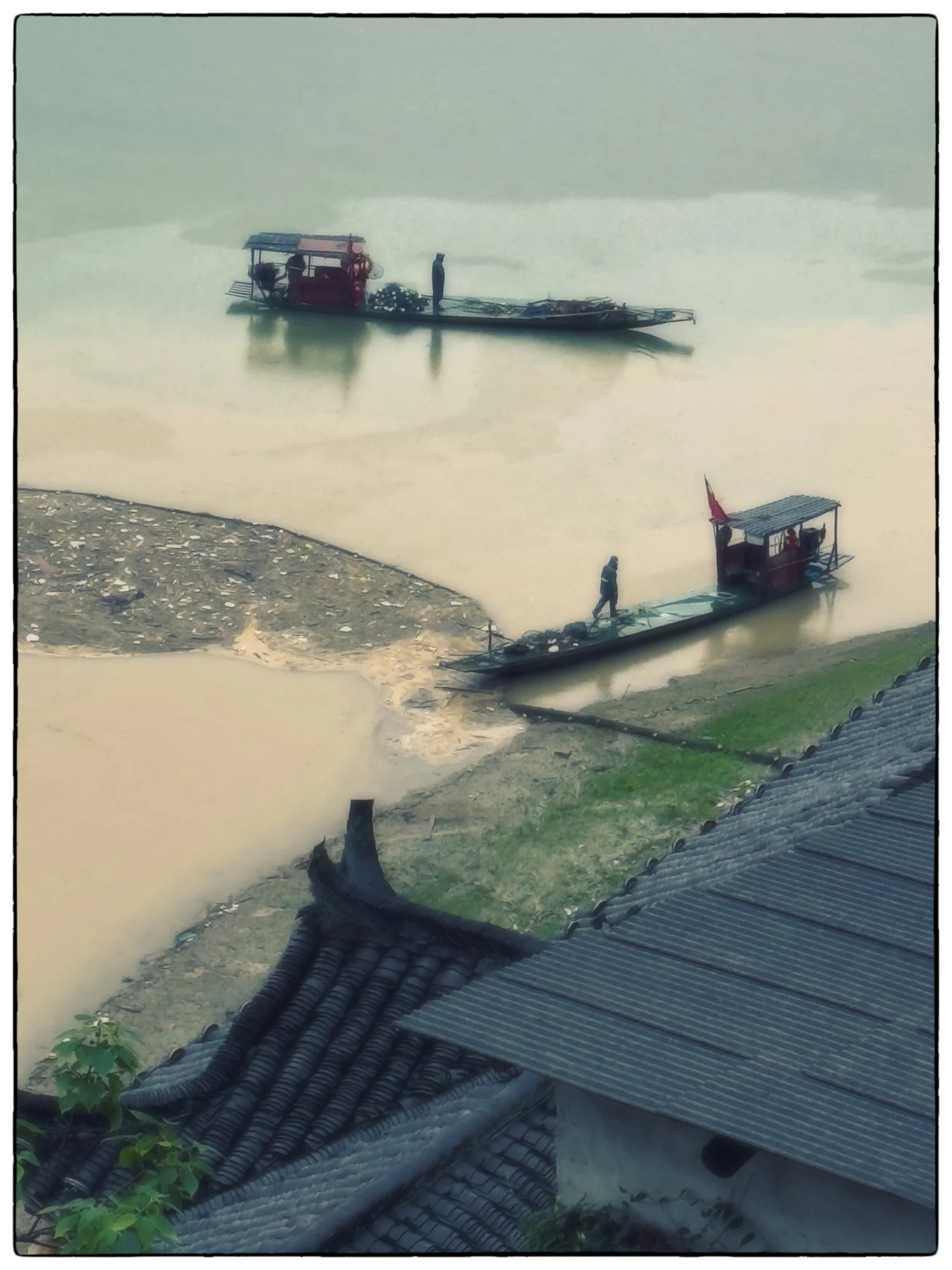 The garbage cleaners collect the debris  in the morning, brought by the current down from waterfall.