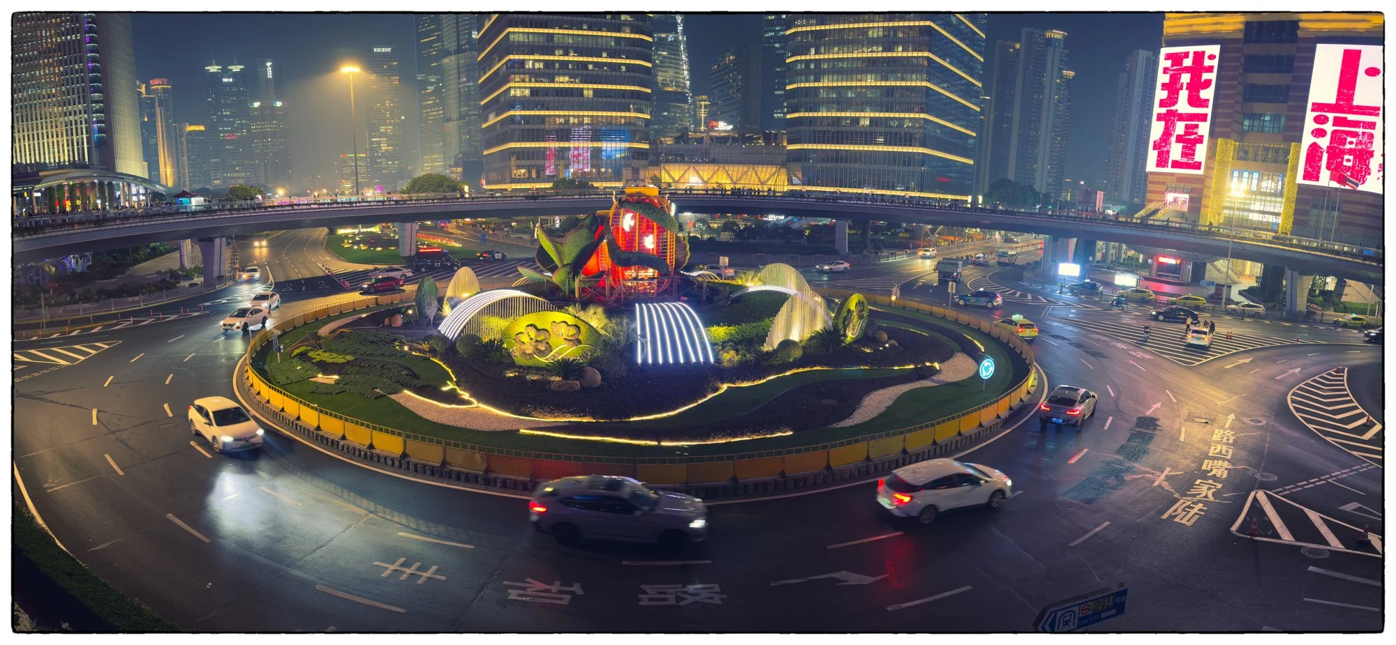 View on Lujiazui roundabout from the walking bridge