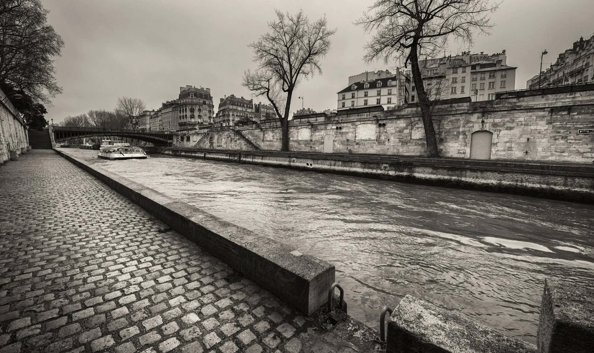 Walking by the Seine in Paris.