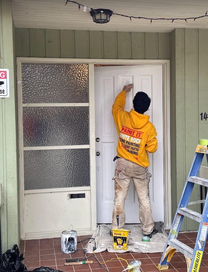 Front door primed. Starting the first top coat!