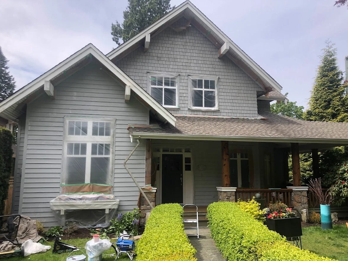 After spraying the siding, before we paint the pillars, the spingles, the front deck and the front door!