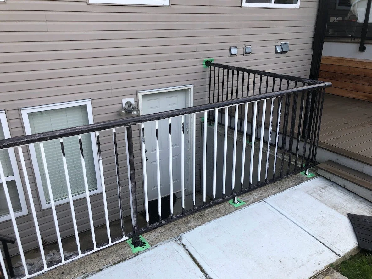 We've started the first coat of black on the railings!