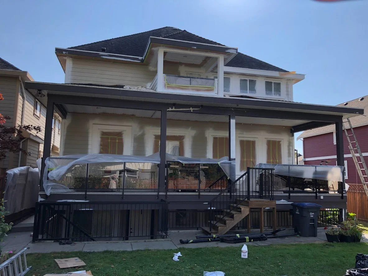 After masking, after spraying the trim, next up: spraying the siding blue!