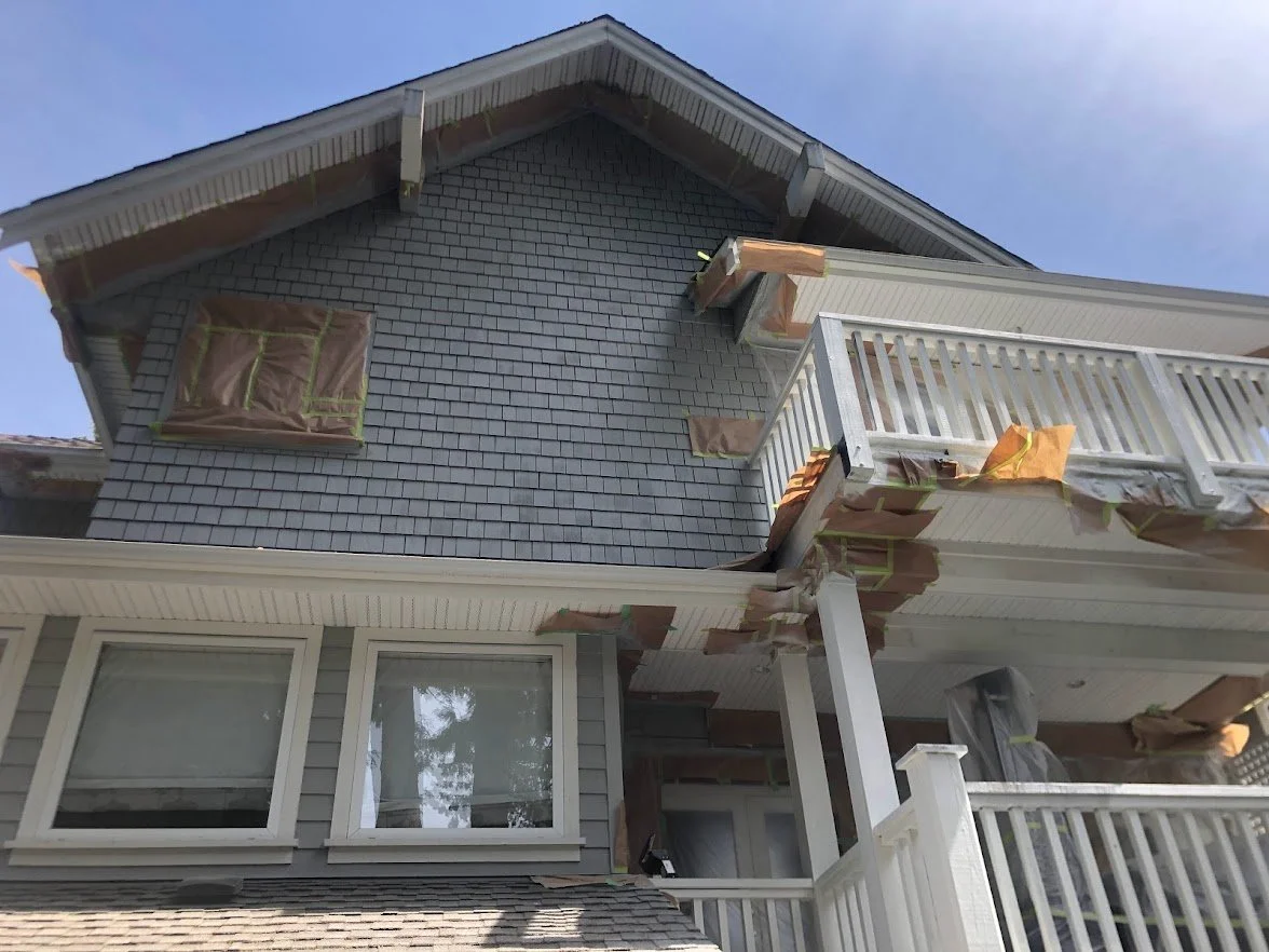 After spraying the siding / shingles and after spraying the railings!