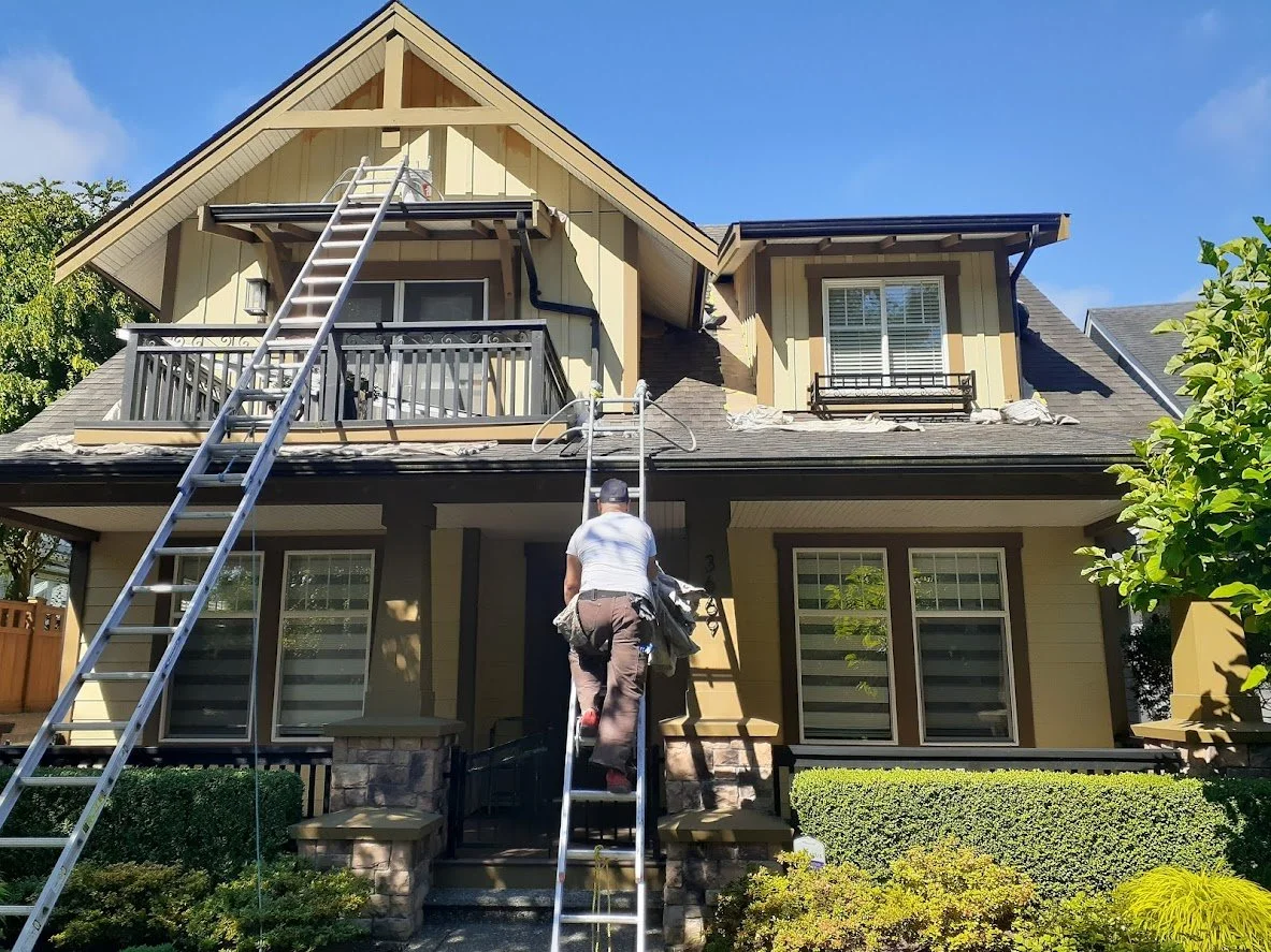 Painting the trim and 2nd floor siding!