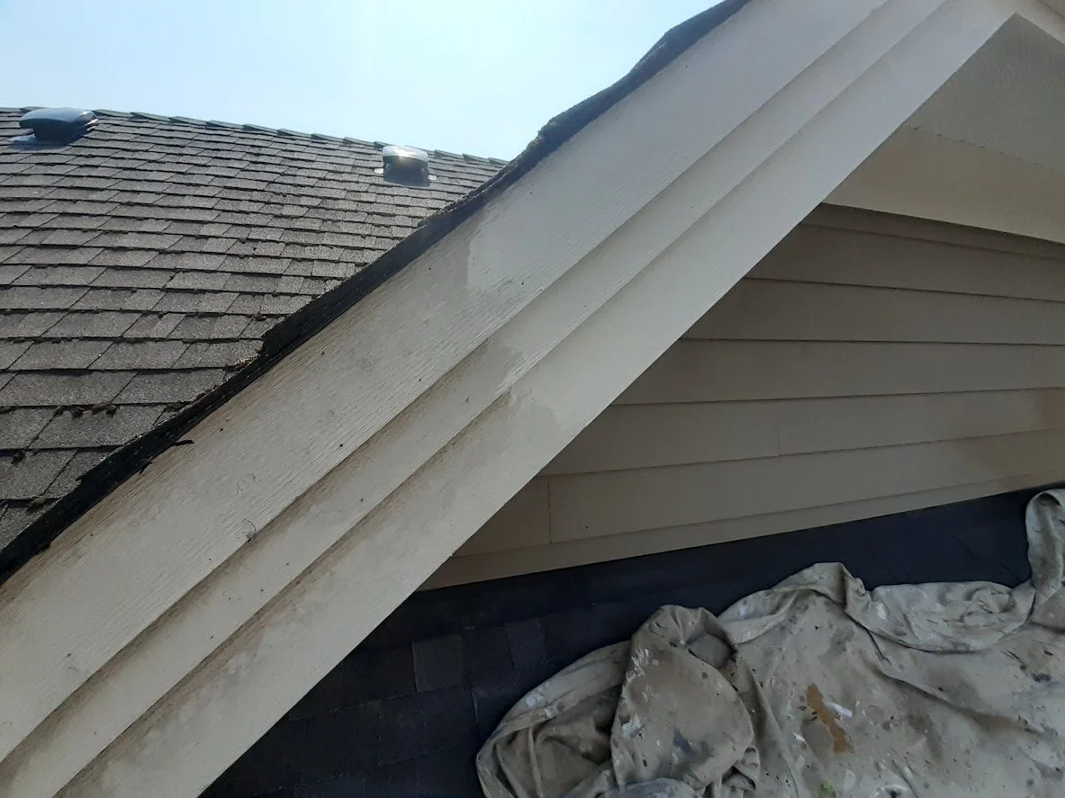 After prep, applying a fresh coat of paint to the fascia & trim!