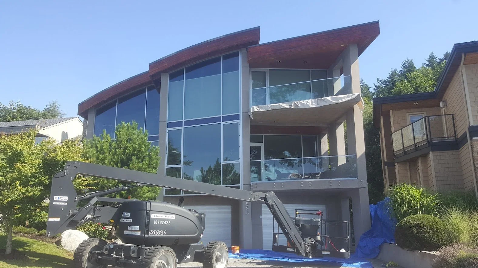 AFTER! Two fresh stain coats on this wood fascia gives it a completely new look!