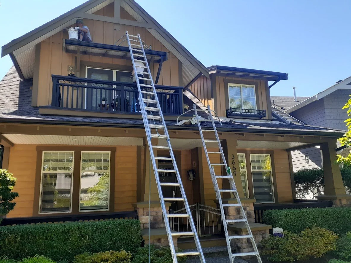 Painting the trim and 2nd floor siding!