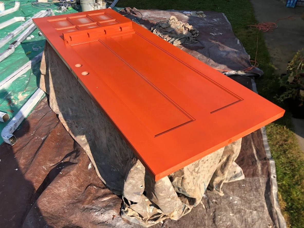 After 2 coats of this bright orange that the client loved! Spray finish!