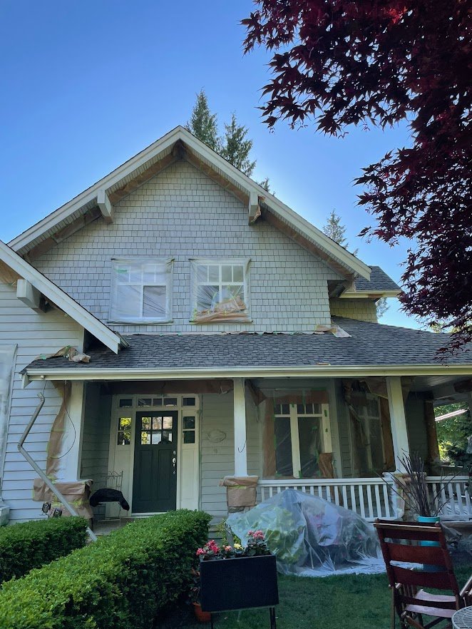 After spraying the siding, after painting the pillows and railing / spingles, before the front door