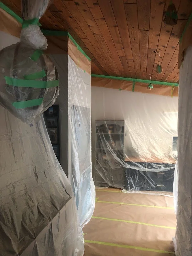 Before .... everything masked off and covered before we spray the wood ceiling panels!