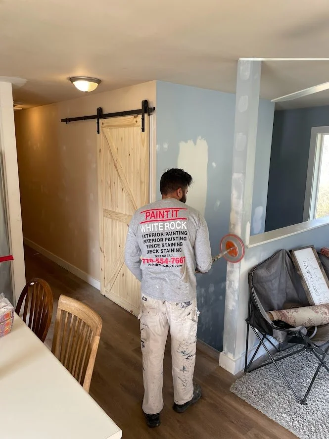 Before .... notice all of the wall patches and touch ups. We are pole sanding the walls before we mask off everything before spraying the ceiling & trim!