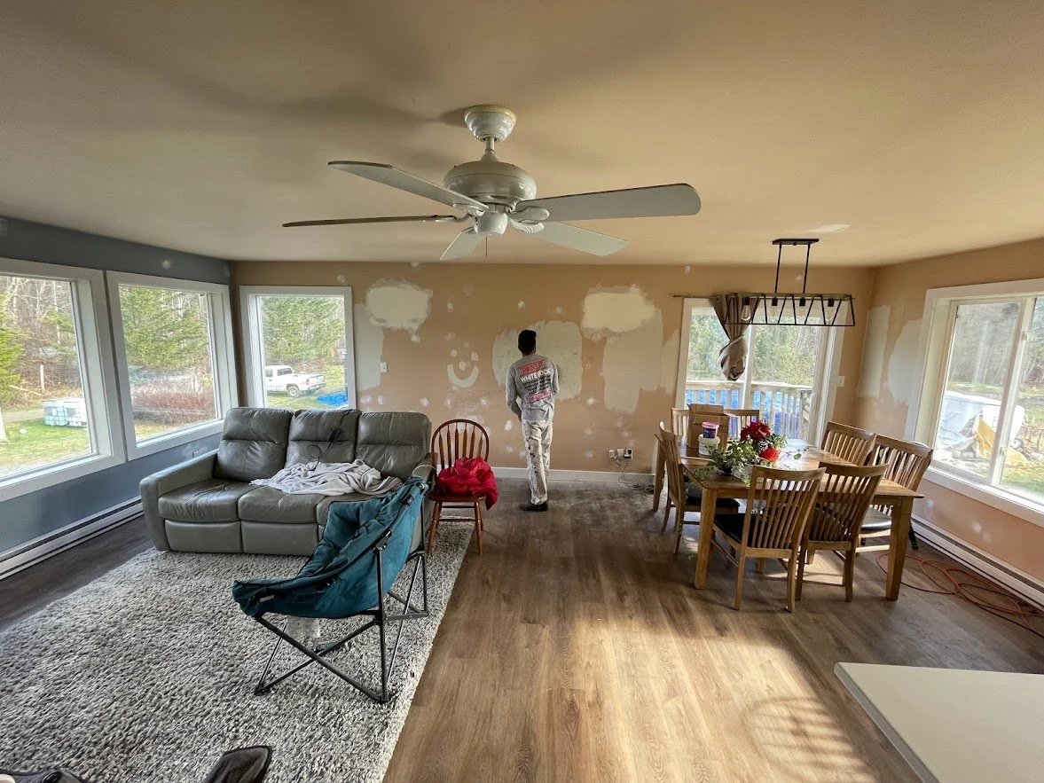 Before .... notice all of the wall patches and touch ups. We are pole sanding the walls before we mask off everything before spraying the ceiling & trim!