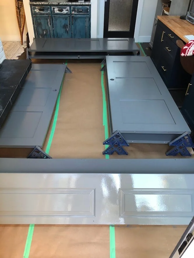 After spraying we covered the floor inside the client's house and then left them inside overnight to dry before hanging them!