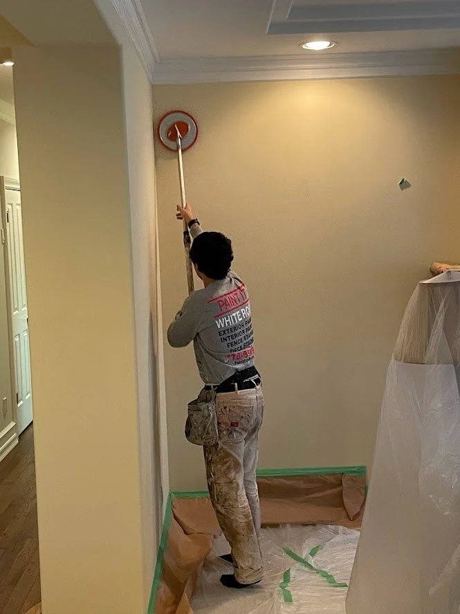 Pole sanding the walls before painting!