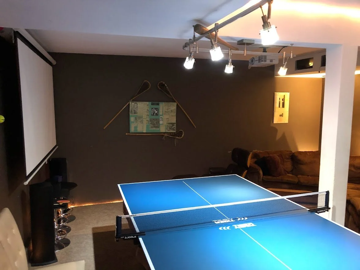 Before ... Look how dark this space looks currently. It also had dozens of marks on the walls from the ping pong matches.
