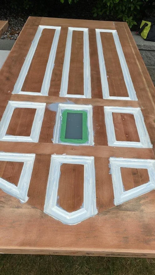 After sanding, we primed the slots / groves.