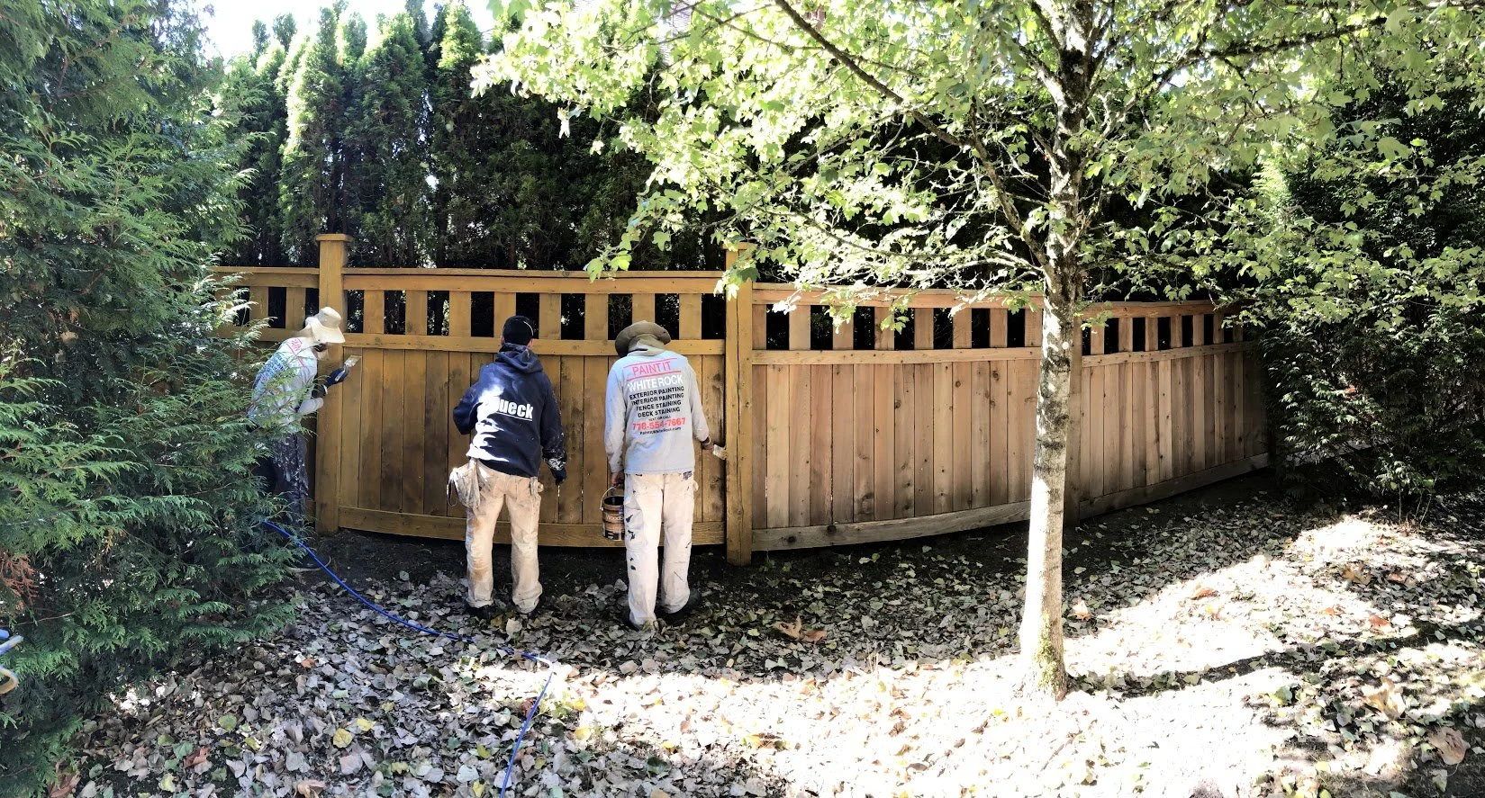 After pressure washing, spraying on the stain and then back brushing!