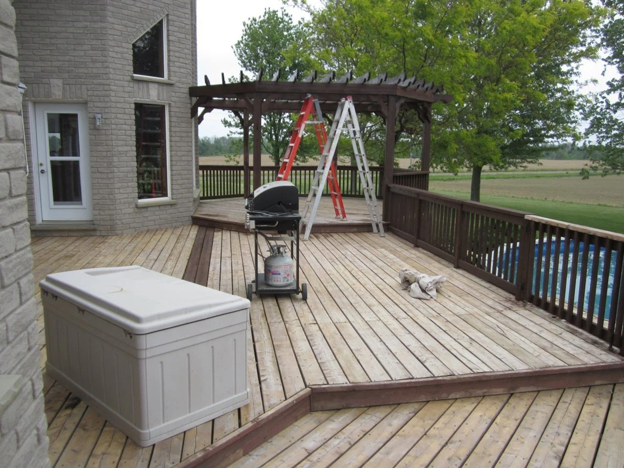 Staining the pergula & railings/spindles, before staining the deck!