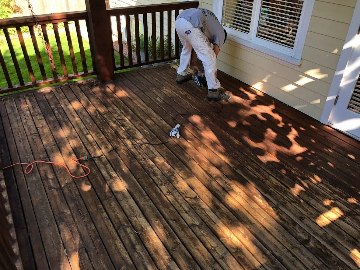 After pressure washing, before sanding