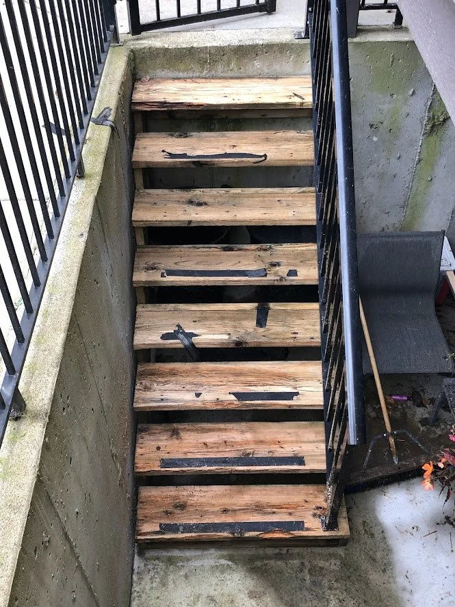 After pressure washing, before sanding