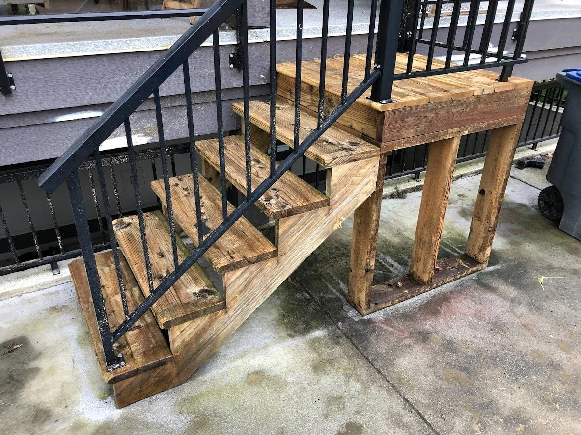 After pressure washing, before sanding