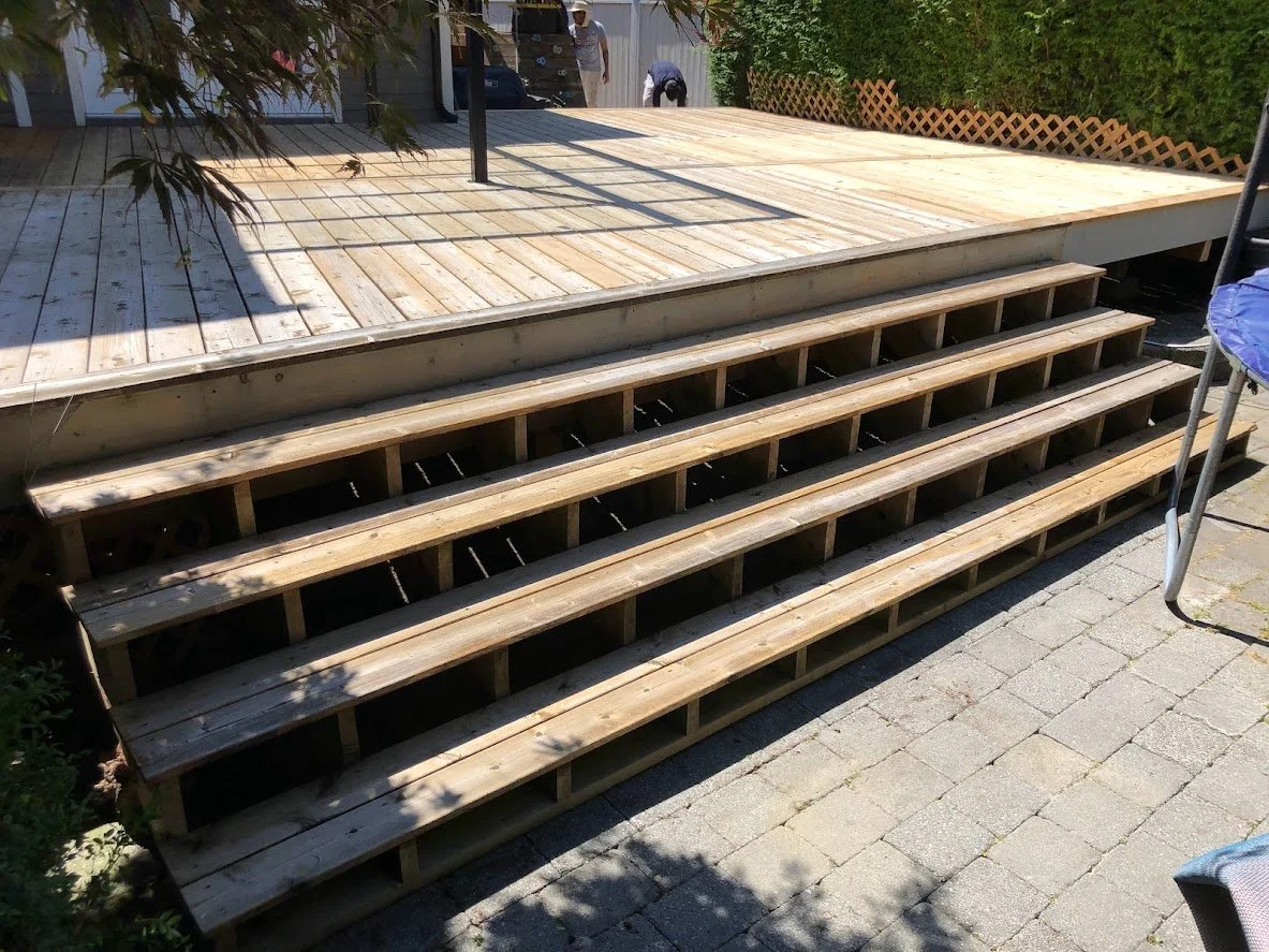 After pressure washing, before staining!