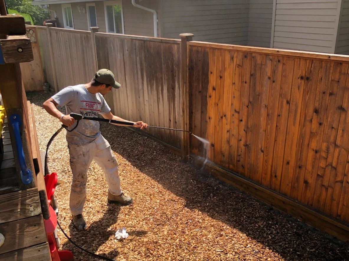 Pressure washing this fence before staining!