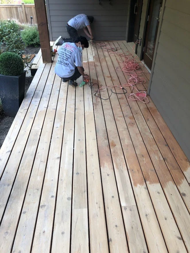 After pressure washing, sanding the deck before staining!