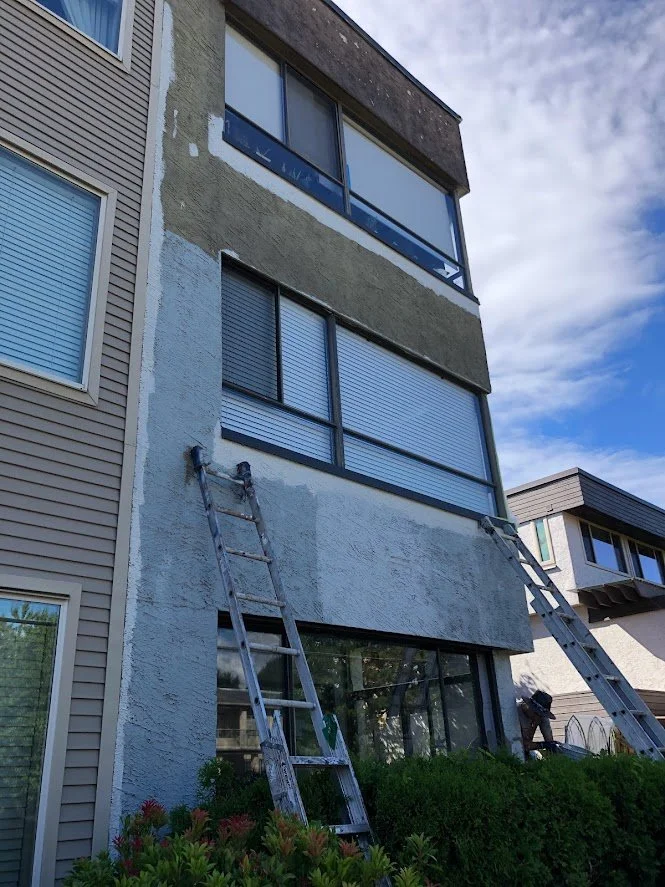 Prepping and priming the stucco!