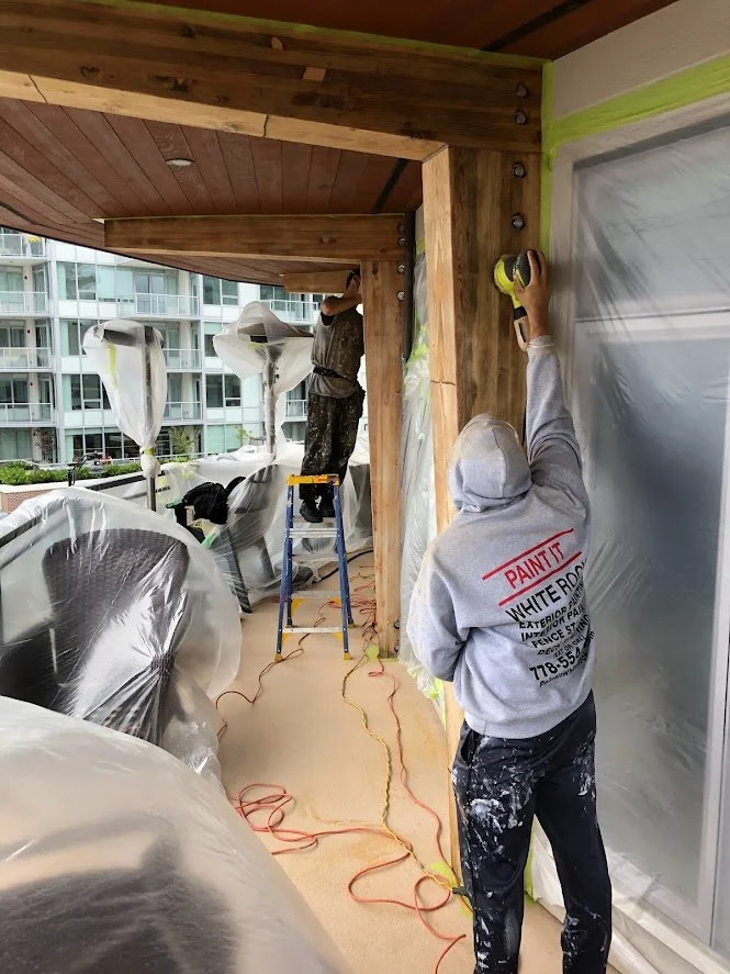 After stripping we are sanding the glulams / pillars / posts before we stain them!