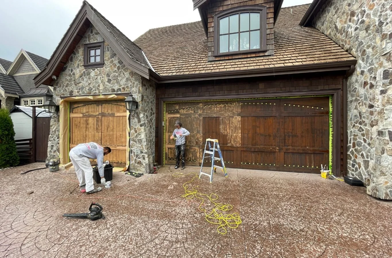 A Paint It White Rock employee providing expert painting company services in Chantrell, BC using precise tools to deliver a seamless, clean finish.