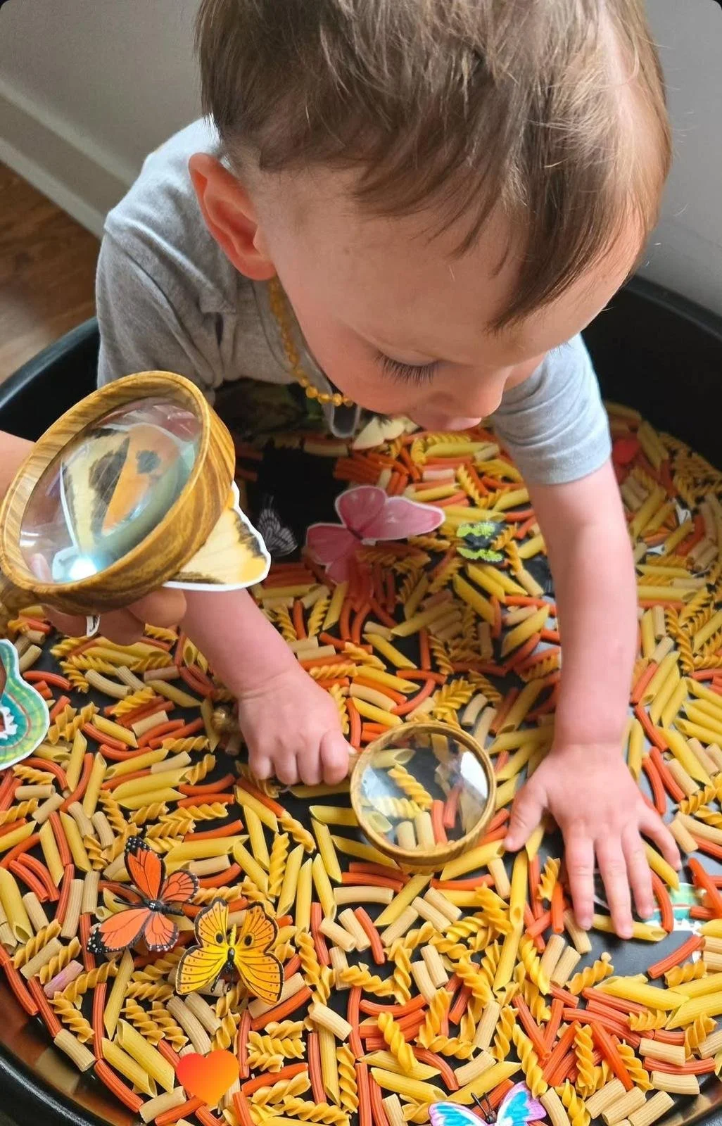 A toddler exploring at the little learning center in Norwalk, CT.
