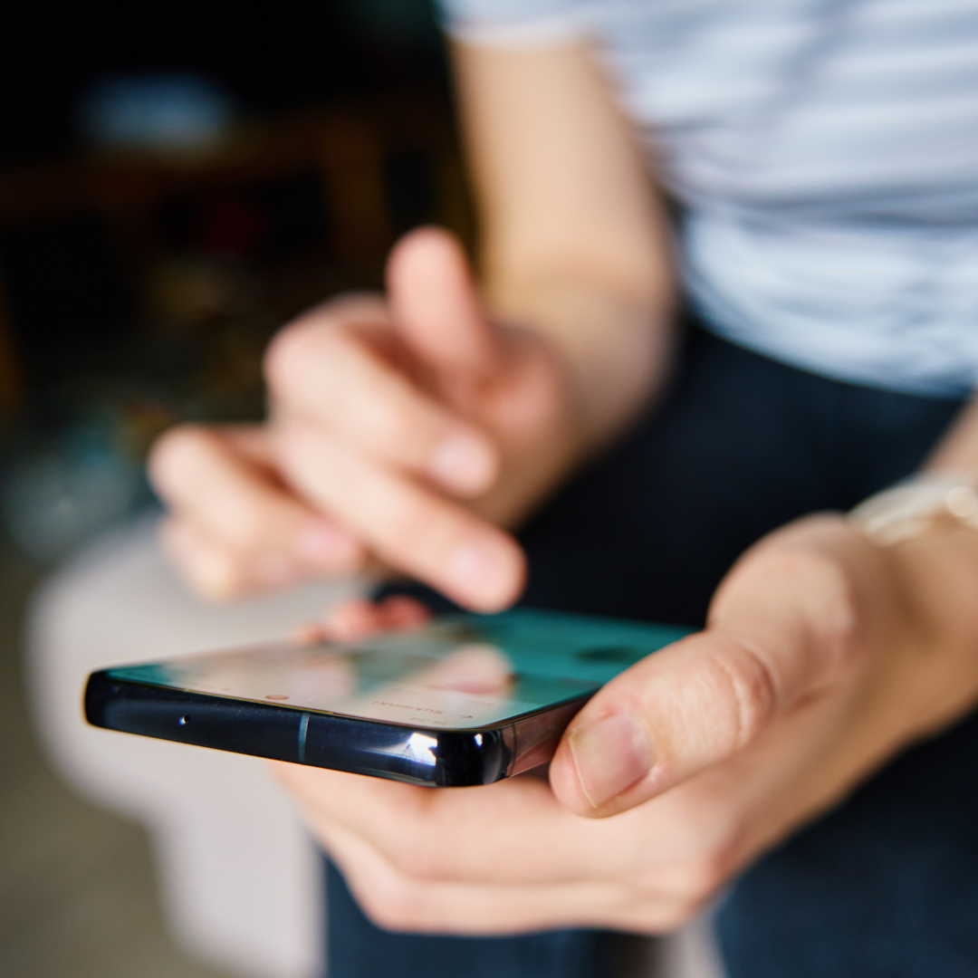 Hands holding a smartphone
