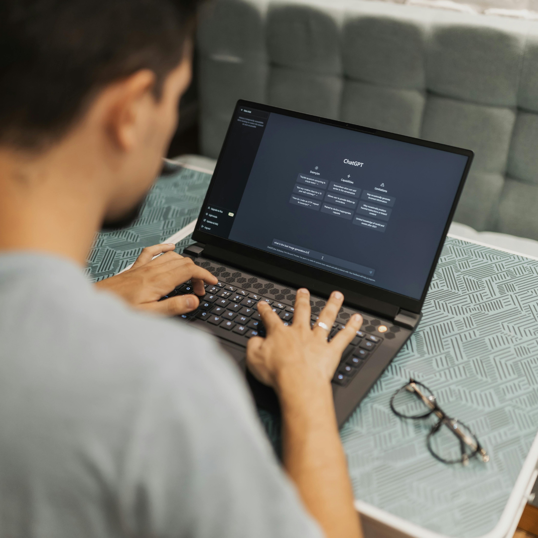 Person typing on a laptop