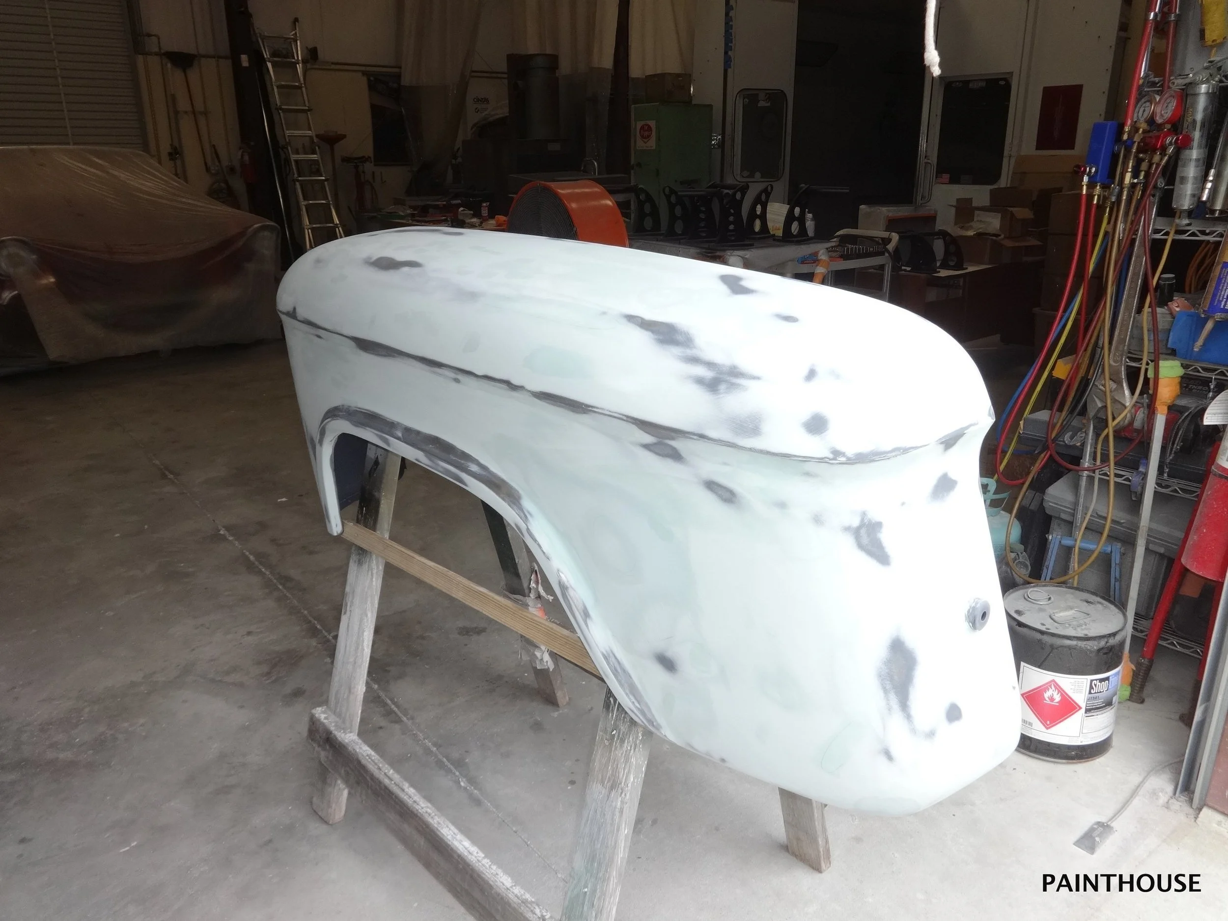 55Persistance_rear fenders bodyworked, first poly primer-001.JPG