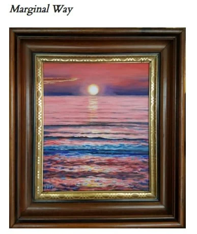 A framed painting of a sunset over the ocean with pink and purple hues, titled 'Marginal Way'.