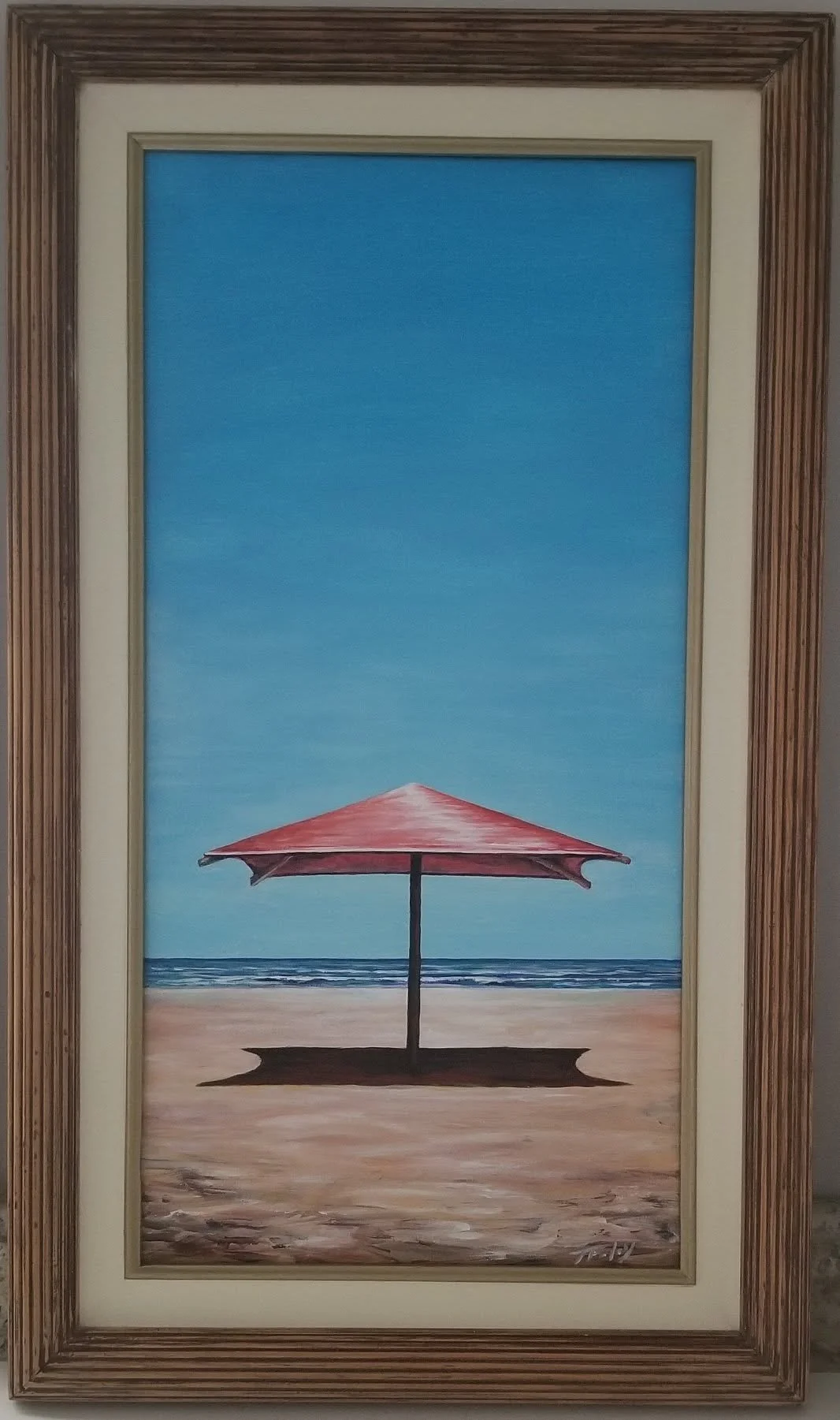 Painting of a beach scene with a red umbrella on sandy shore and the ocean in the background.