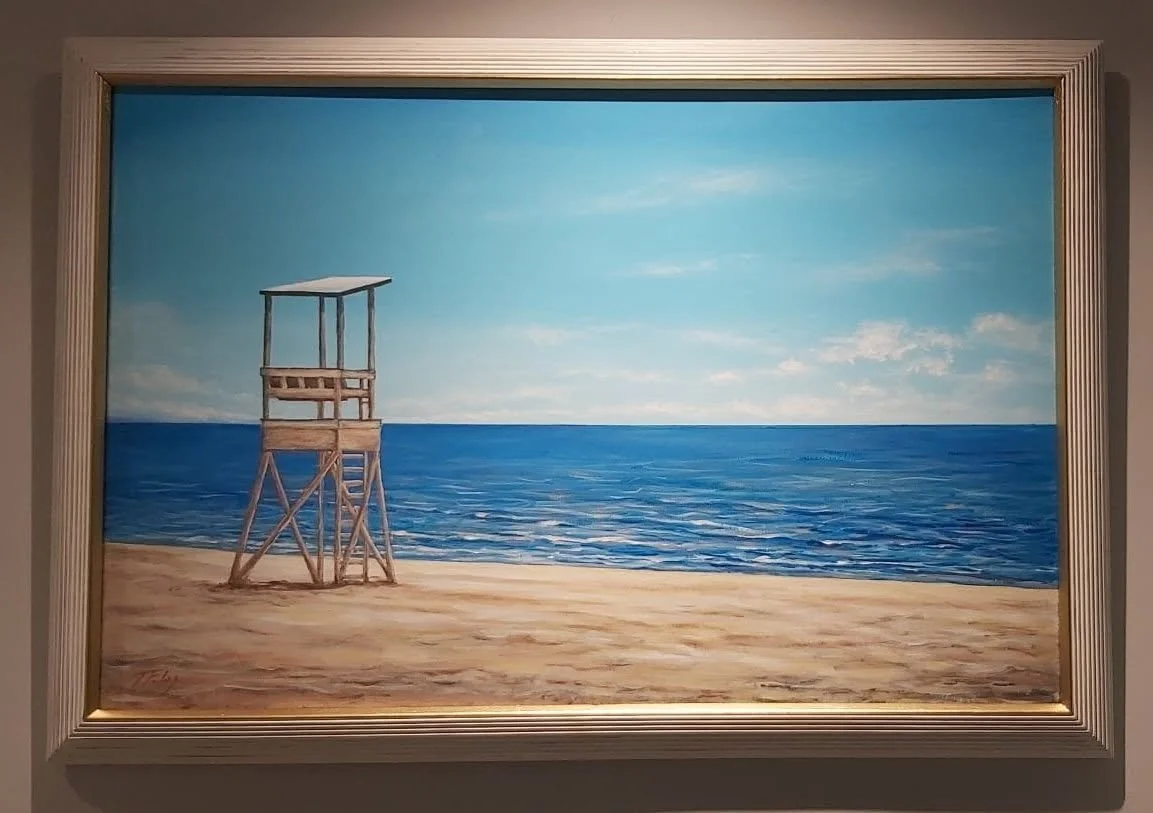 Painting of a beach scene with a wooden lifeguard tower, sandy shore, blue ocean, and sky with some clouds.