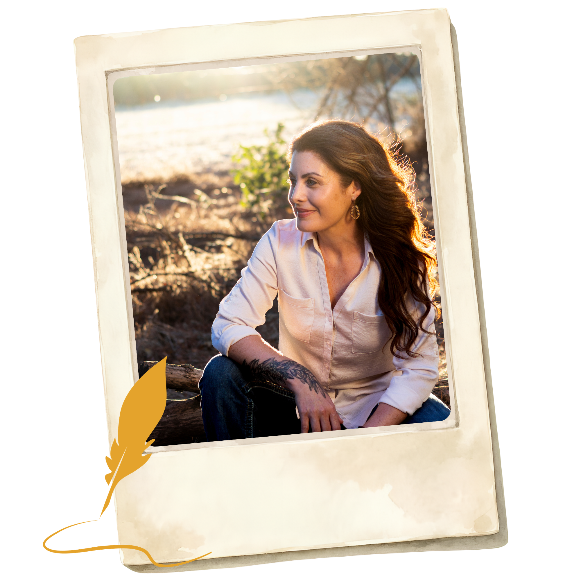 A portrait of a woman with long wavy brown hair, sitting outdoors in a field during golden hour, with sunlit background, wearing earrings and a light-colored shirt, seen through a white frame.